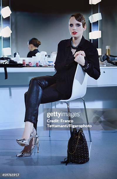 Singer Anna Calvi is photographed for Madame Figaro on September 26, 2013 in Paris, France. Shirt , pants , necklace , cuff , shoes , necklace and...