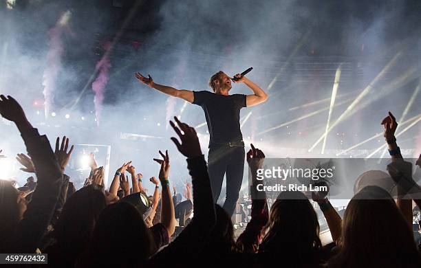 Dan Reynolds of Imagine Dragons perform during the half time of during the 102nd Grey Cup Championship Game between the Hamilton Tiger-Cats and the...