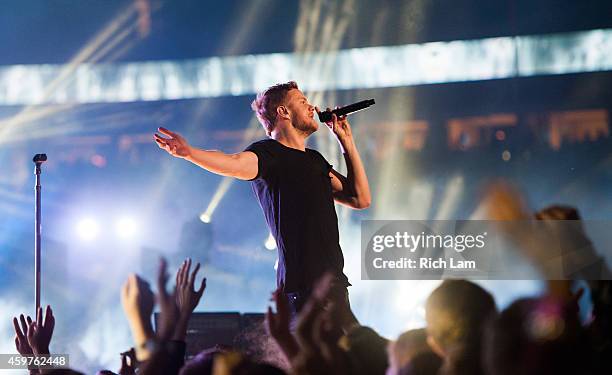 Dan Reynolds of Imagine Dragons perform during the half time of during the 102nd Grey Cup Championship Game between the Hamilton Tiger-Cats and the...