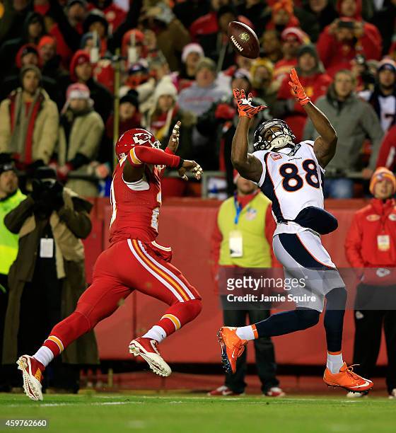 Demaryius Thomas of the Denver Broncos catches a pass against Sean Smith of the Kansas City Chiefs during the first quarter at Arrowhead Stadium on...
