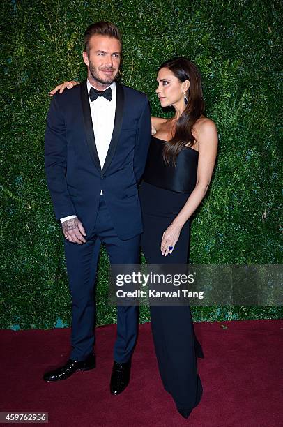 David Beckham and Victoria Beckham attend the 60th London Evening Standard Theatre Awards at London Palladium on November 30, 2014 in London, England.