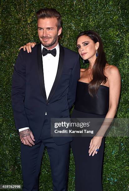 David Beckham and Victoria Beckham attend the 60th London Evening Standard Theatre Awards at London Palladium on November 30, 2014 in London, England.