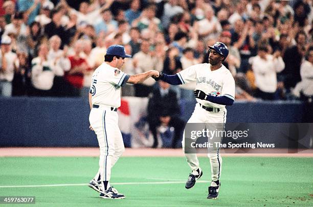 Devon White of the Toronto Blue Jays runs the bases during a 1993 World Series game against the Philadelphia Phillies.