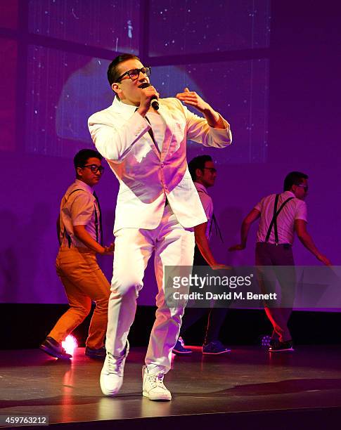 Dean John-Wilson and the cast of 'Here Lies Love' perform at the 60th London Evening Standard Theatre Awards at the London Palladium on November 30,...