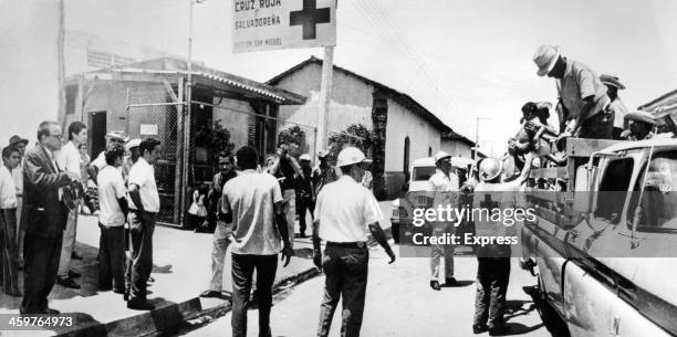 Trucks and jeeps are brought into action to uplift the persons displaced by the "Football War" between Honduras and El Salvador. July 29,1969.