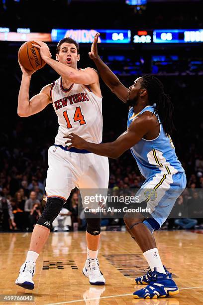 Kenneth Faried of the Denver Nuggets guards Jason Smith of the New York Knicks at Madison Square Garden on November 16, 2014 in New York City. NOTE...
