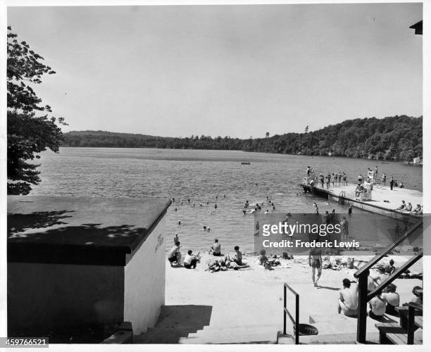 View as bathers and swimmers at at Walden Pond in Concord, Massachusetts. Circa 1950.