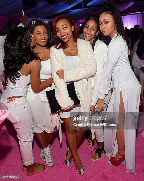 Breaunna Womack and Zonnique Pullins attend Reginae's "All White" Sweet 16 birthday party at Summerour Studio on November 29, 2014 in Atlanta,...