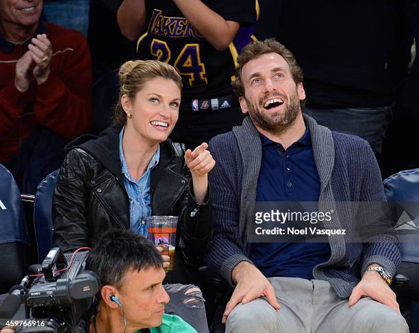 Erin Andrews and Jarret Stoll attend a basketball game between the Toronto Raptors and the Los Angeles Lakers at Staples Center on November 30, 2014...