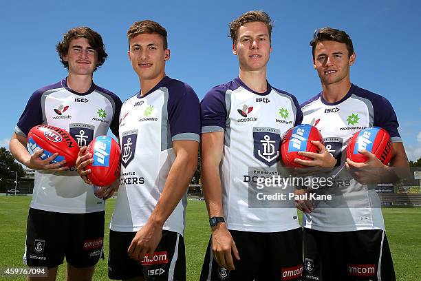 New recruits Connor Blakely, Josh Deluca, Ed Langdon and Lachlan Weller of pose for for a photo following a Fremantle Dockers AFL media session at...