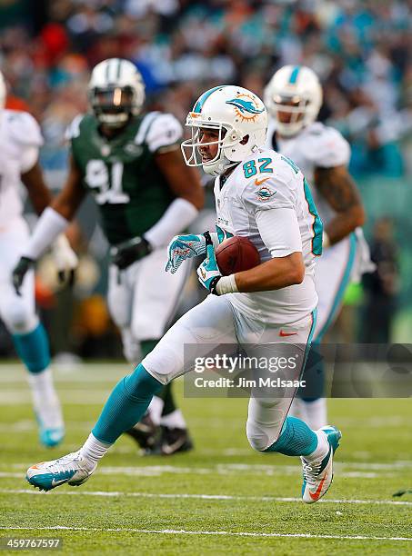 Brian Hartline of the Miami Dolphins in action against the New York Jets on December 1, 2013 at MetLife Stadium in East Rutherford, New Jersey. The...