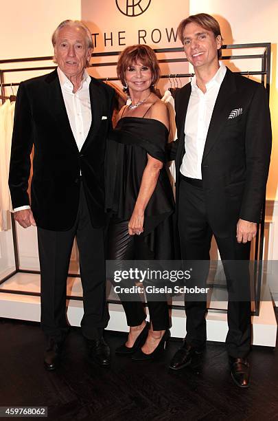 Marion Heinrich, her husband Leo Benz and her son Sascha Benz pose during Mary-Kate Olsen and Ashley Olsen present their collection 'The Row' at...