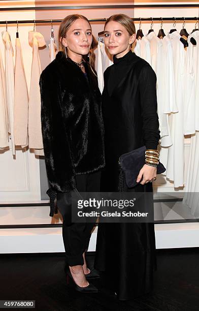 Mary-Kate Olsen and her twin sister Ashley Olsen pose during Mary-Kate Olsen and Ashley Olsen present their collection 'The Row' at Marion Heinrich...