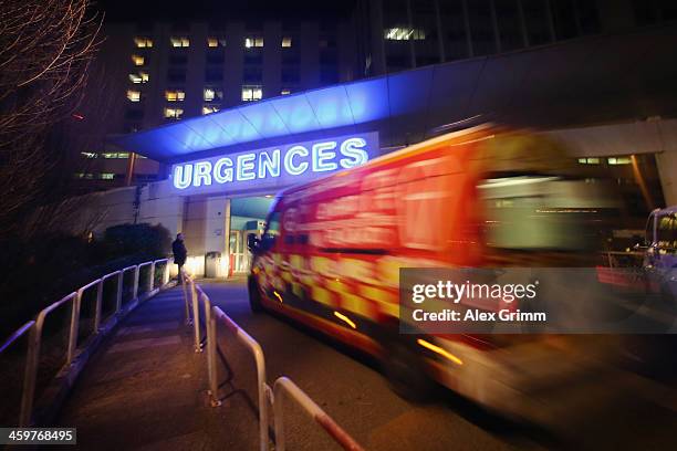 An emergency ambulance arrives at the Grenoble Hospital where former German Formula One driver Michael Schumacher is being treated for a severe head...