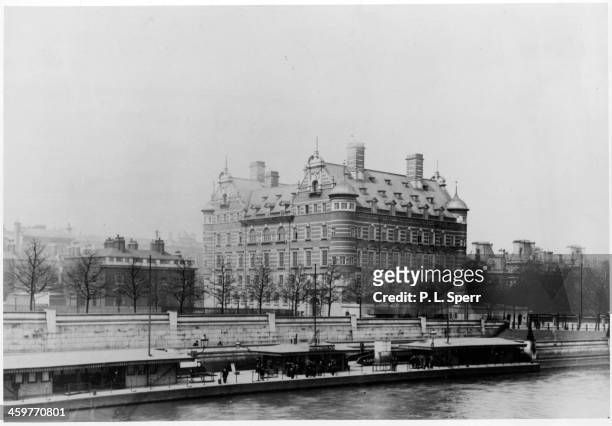 View of Scotland Yard from across the Thames River in London, England. Circa 1900.