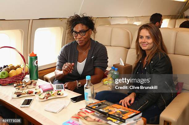 Serena Williams and Daniela Hantuchova of the Singapore Slammers on a private jet from Manila to Singapore prior to the Coca-Cola International...