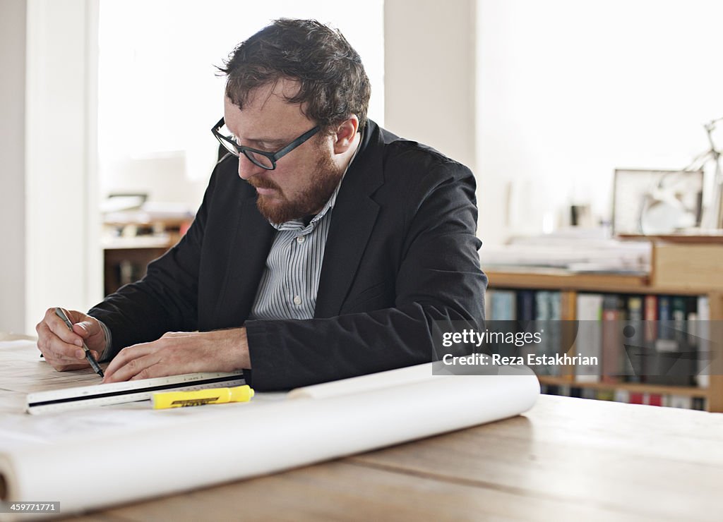 Designer corrects plans