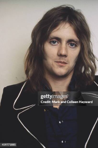 Drummer Roger Taylor from English rock group Queen posed in lead singer Freddie Mercury's flat, Holland Road, West Kensington, London in early 1974.