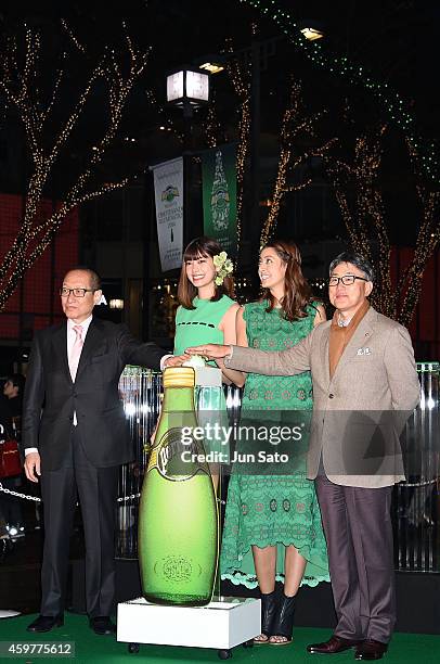 President and Chief Executive Officer of Nestle Japan, Kozo Takaoka, models Hikari Mori and Izumi Mori attend the Omotesando Illumination Lighting...