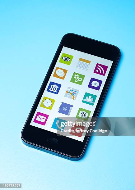 smart phone with icons - app icons stock pictures, royalty-free photos & images