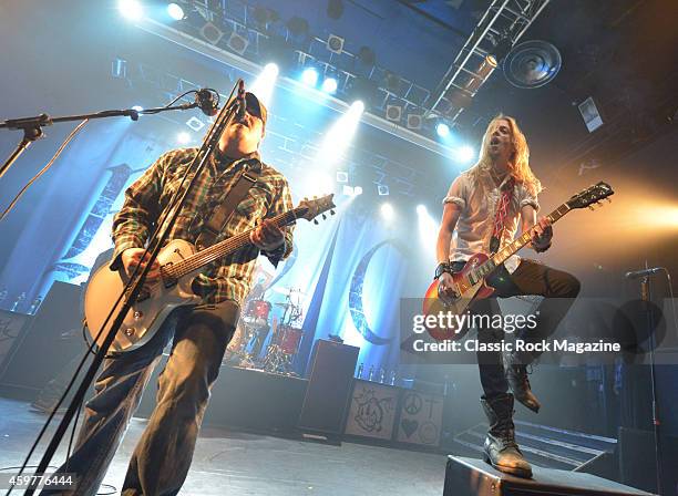 Guitarists Chris Robertson and Ben Wells of American rock group Black Stone Cherry performing live on stage at KOKO in London, on February 28, 2014.