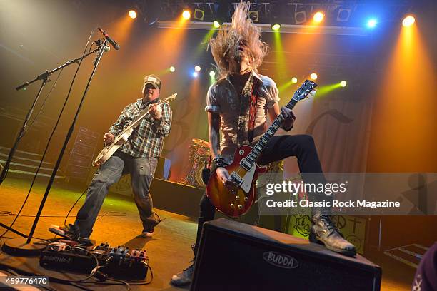 Guitarists Chris Robertson and Ben Wells of American rock group Black Stone Cherry performing live on stage at KOKO in London, on February 28, 2014.