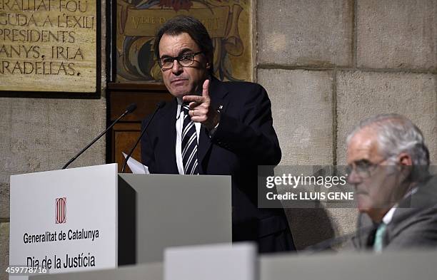 President of Catalonia's regional government Artur Mas delivers a speech past chief prosecutor of Catalonia Jose Maria Romero de Tejada during the...