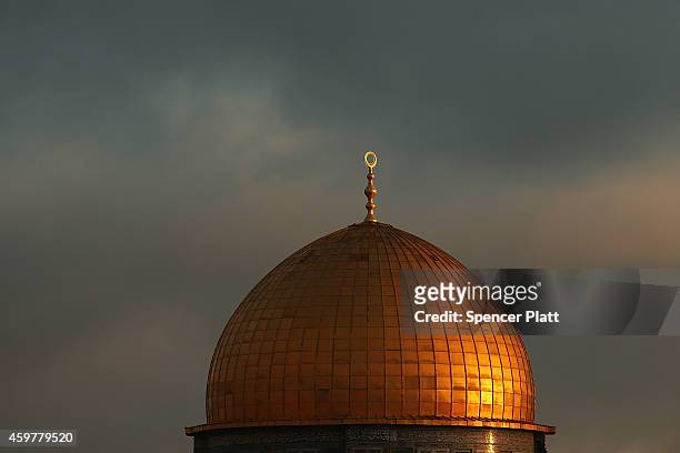 The Dome of the Rock is viewed at the Al-Aqsa mosque compound in the Old City on December 01, 2014 in Jerusalem, Israel. The Dome of the Rock is the...