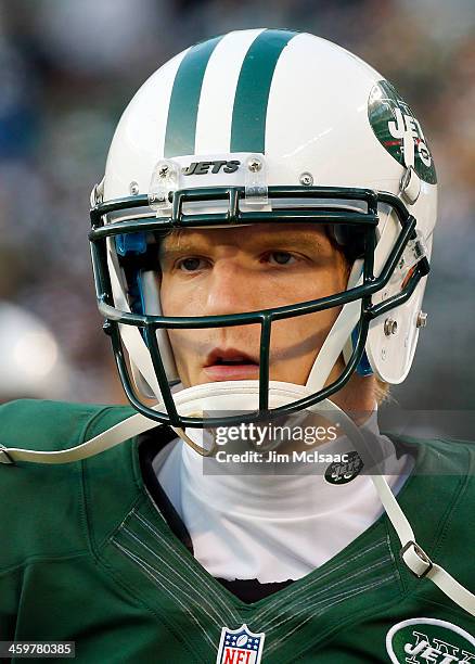 Matt Simms of the New York Jets looks on against the Miami Dolphins on December 1, 2013 at MetLife Stadium in East Rutherford, New Jersey. The...