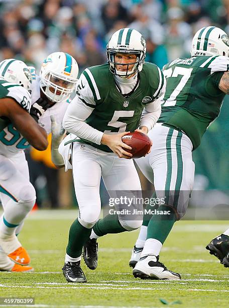 Matt Simms of the New York Jets in action against the Miami Dolphins on December 1, 2013 at MetLife Stadium in East Rutherford, New Jersey. The...