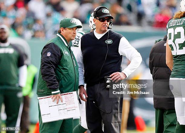Head coach Rex Ryan and offensive coordinator Marty Mornhinweg of the New York Jets look on against the Miami Dolphins on December 1, 2013 at MetLife...