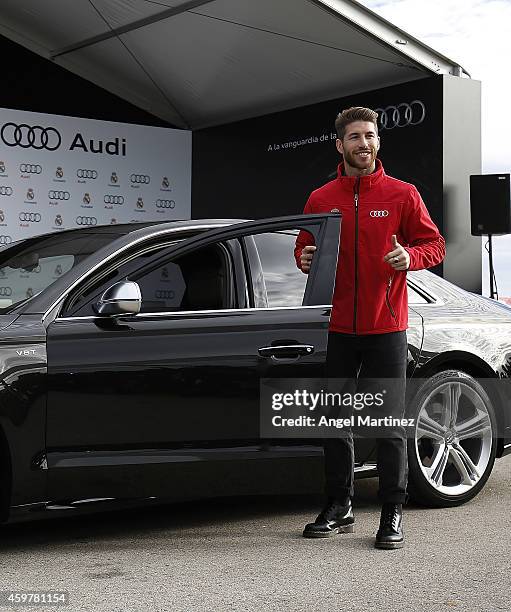 Sergio Ramos of Real Madrid poses during the car handover of Audi at Ciudad Real Madrid on December 1, 2014 in Madrid, Spain.