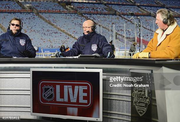 Hosts E.J. Hradek and Darren Pang talk with hockey analyst Barry Melrose on NHL Live during the 2014 Bridgestone NHL Winter Classic on December 30,...