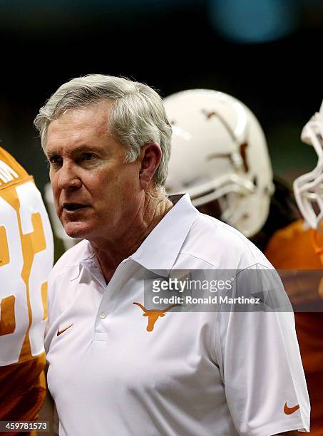 Head coach Mack Brown of the Texas Longhorns looks on against the Oregon Ducks during the Valero Alamo Bowl at the Alamodome on December 30, 2013 in...