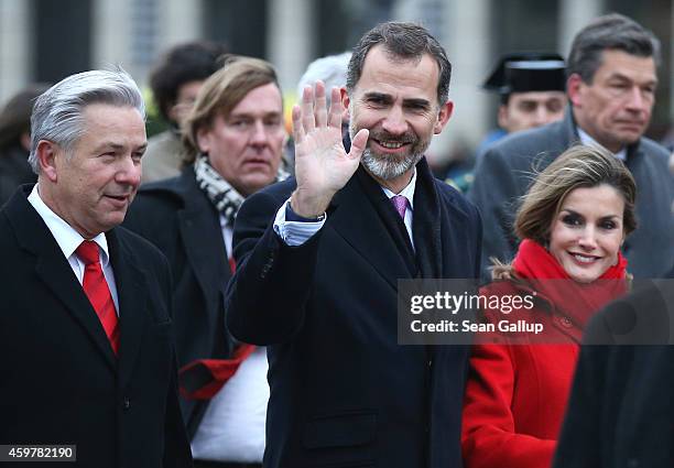 King Felipe VI and Queen Letizia of Spain are accompanied by Berlin Mayor Klaus Wowereit as they visit Brandenburg Gate on December 1, 2014 in...