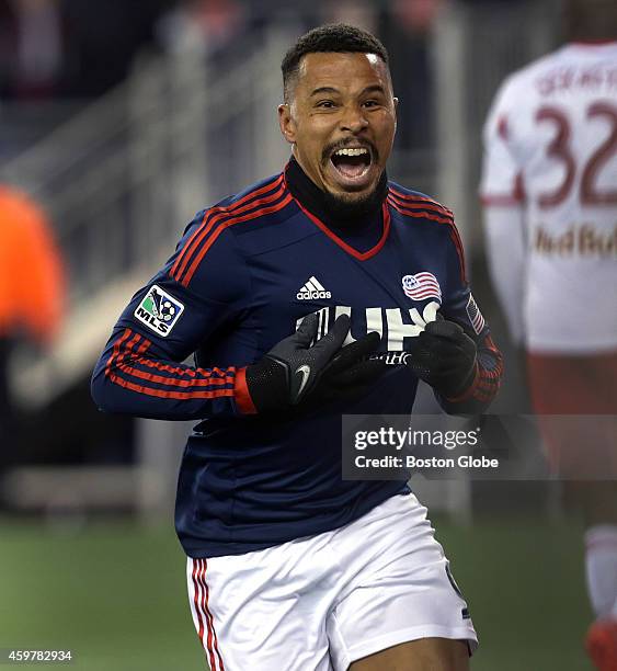 New England Revolution forward Charlie Davies celebrates after scoring his second goal of the game to tie the score at 2-2. The New England...