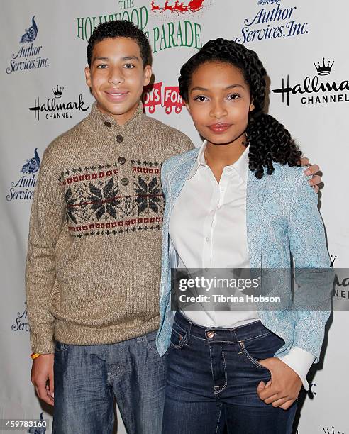 Marcus Scribner and Yara Shahidi attend the 83rd annual Hollywood Christmas parade on November 30, 2014 in Hollywood, California.