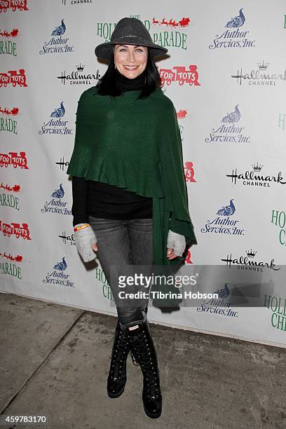 Rena Sofer attends the 83rd annual Hollywood Christmas parade on November 30, 2014 in Hollywood, California.