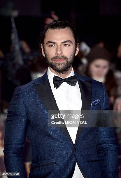Irish actor Aidan Turner poses for pictures on the red carpet upon arrival for the world premier of "The Hobbit: The Battle of the Five Armies" in...