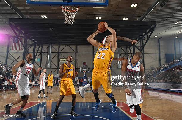 Eloy Vargas of the Los Angeles D-Fenders goes to the basket past Josh Bostic of the Grand Rapids Drive during the NBA D-League game on November 26,...