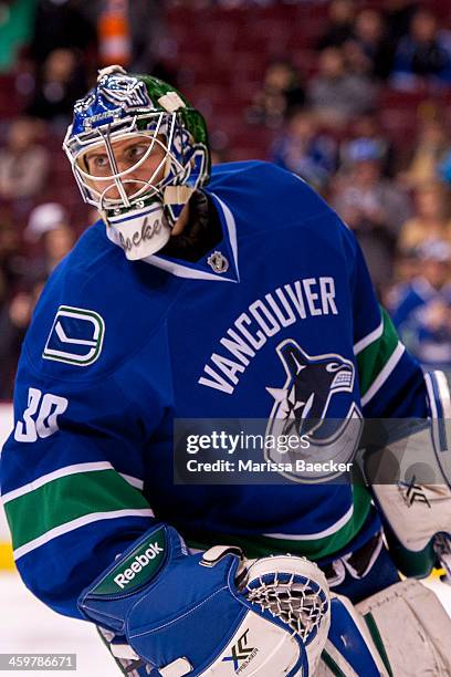 Joacim Eriksson of the Vancouver Canucks warms up against the Philadelphia Flyers on December 30, 2013 at Rogers Arena in Vancouver, British...