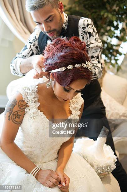 Nicole "Snooki" Polizzi and hair stylist Luis Miller are seen during the wedding of Nicole "Snooki"Polissi and Jionni Lavalle at St. Rose Of Lima on...