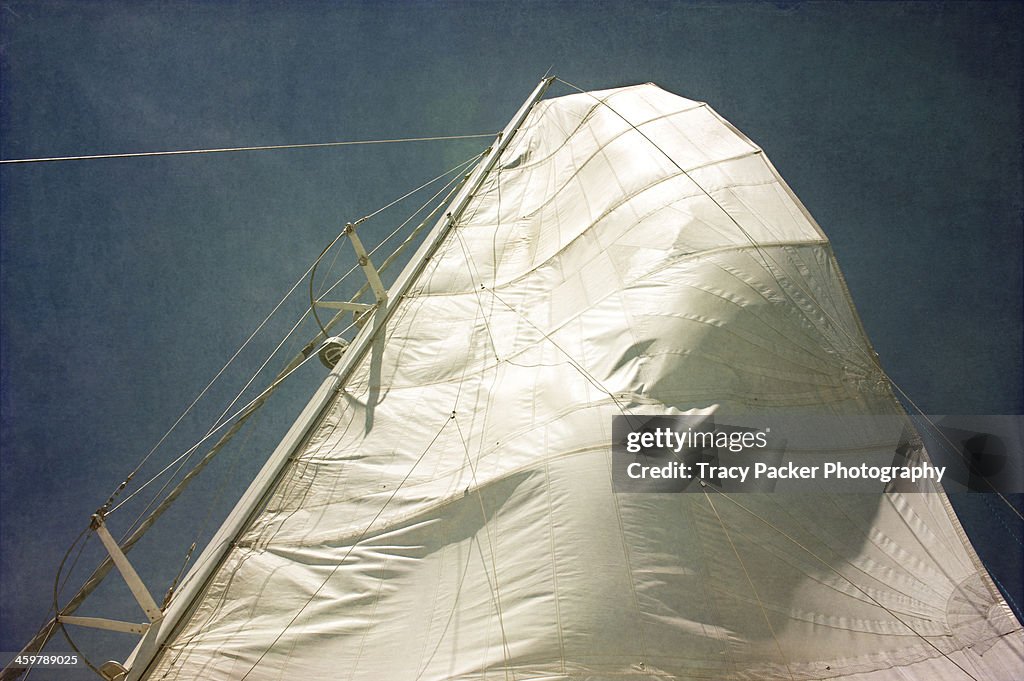 A canvas sail filling with wind.