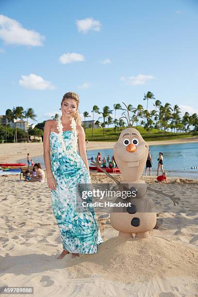 In this handout photo provided by Disney Parks, 'Modern Family' star Sarah Hyland is photographed on the beach at at Aulani, a Disney Resort & Spa,...