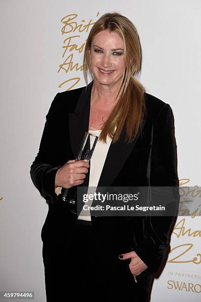 Accessory designer Anya Hindmarch poses in the winners room at the British Fashion Awards at London Coliseum on December 1, 2014 in London, England.
