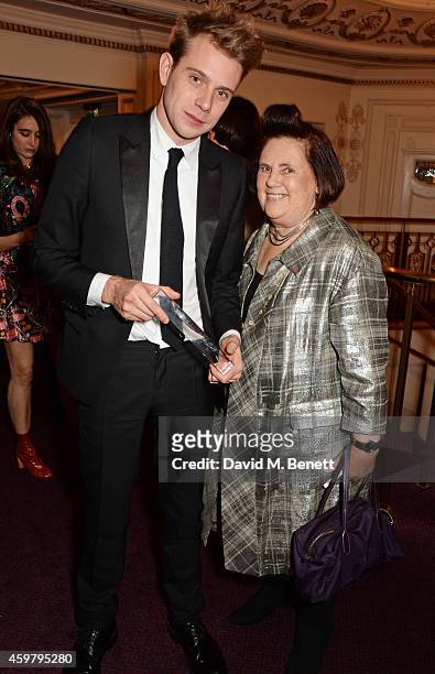 Anderson , winner of the Menswear Award, and Suzy Menkes attend the British Fashion Awards at the London Coliseum on December 1, 2014 in London,...