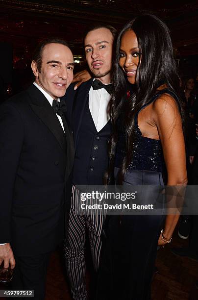 John Galliano, Alexis Roche and Naomi Campbell attend a party in celebration of Edward Enninful in The Oscar Wilde Bar, Hotel Cafe Royal, on December...