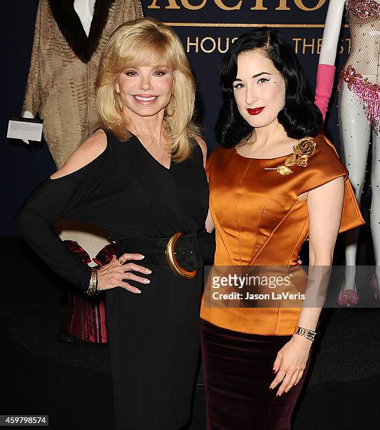 Loni Anderson and Dita Von Teese attend the media press event of the collection of Gypsy Rose Lee at Julien's Auctions Gallery on December 1, 2014 in...