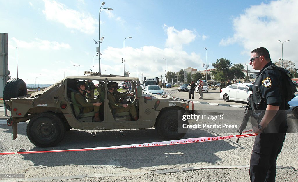 Israeli police carry out forensic work at the site of an...