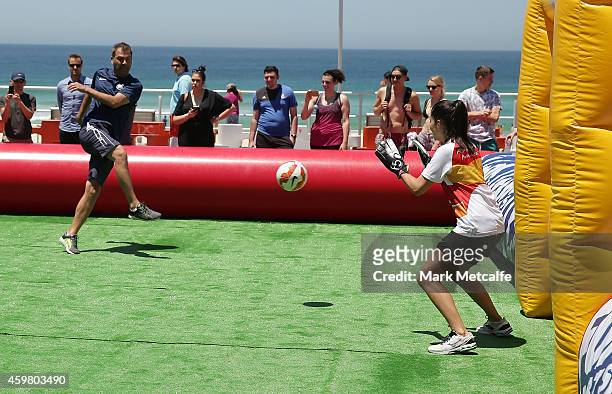 Mel MacLaughlin saves a shot from Mark Rudan during the all-stars match during the Fox Sports Asian Cup coverage launch at Bondi Beach on December 2,...